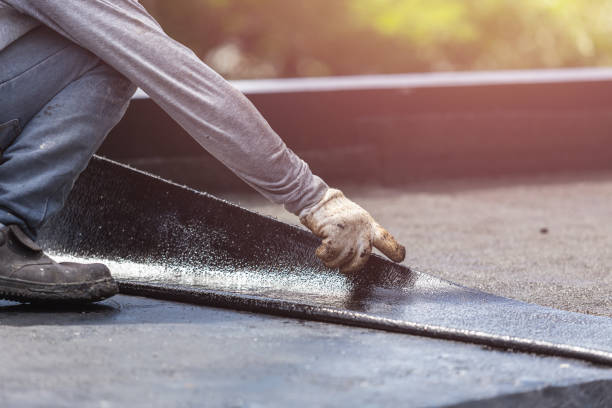 Professional Basement Waterproofing technician working in New Richmond, WI